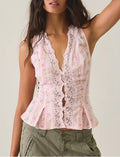 Blusa sin mangas estampado floral rosa con encaje y bajo peplum