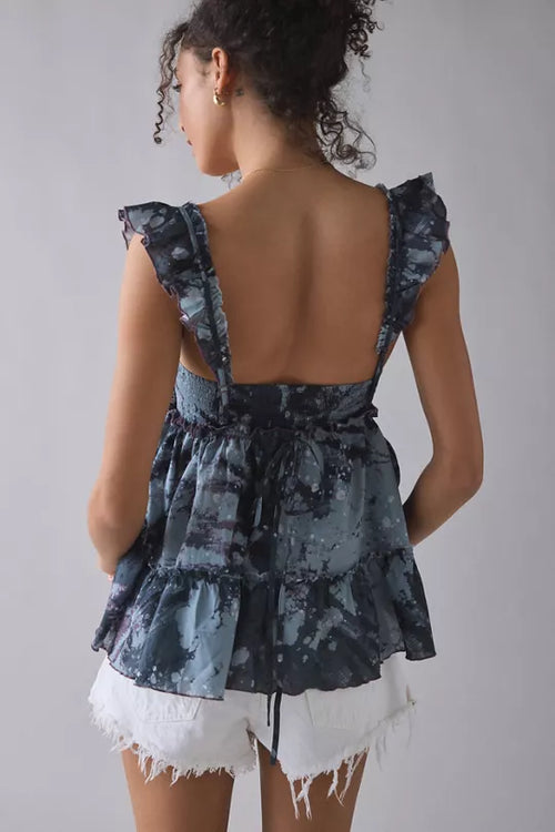 Blusa túnica babydoll estampado oscuro con volantes, tirantes alados y lazos traseros